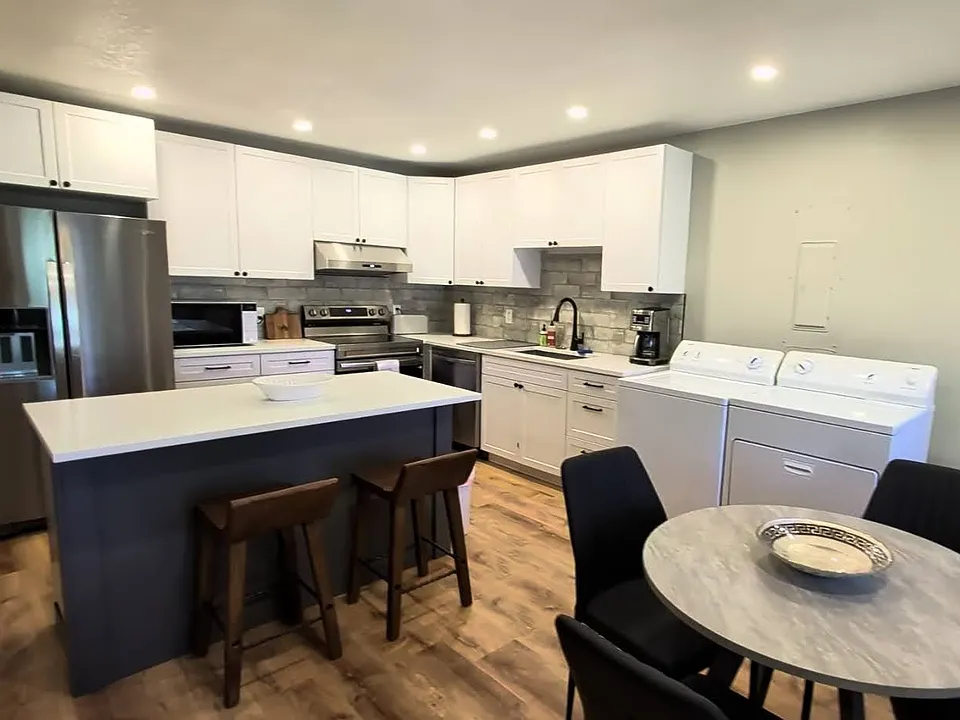 Kitchen with in unit Washer and Dryer