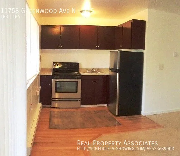 Ground Floor Corner One Bedroom Apartment with a Balcony Deck — Photo 3
