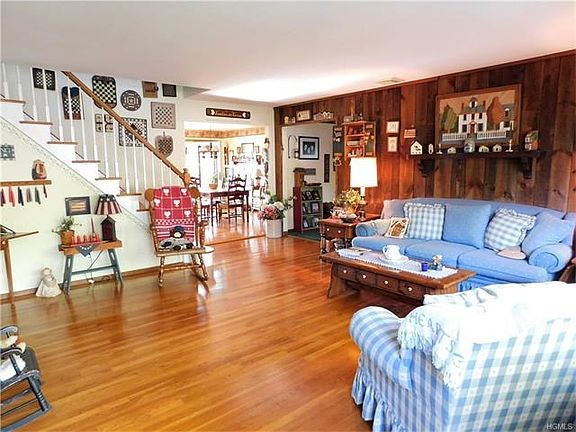 Living room with gleaming hardwood floors.