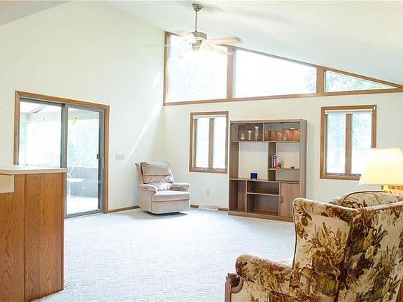 Stunning family room that opens out to the screened in porch