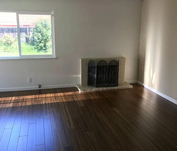 Newly installed hardwood floors in LR