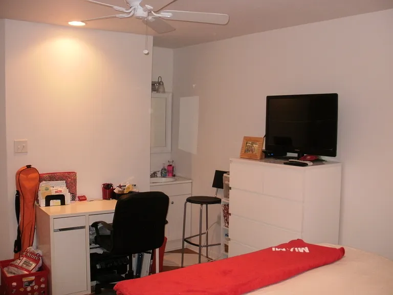 Master bedroom, pictured from window.
Notice the private vanity sink & mirror.