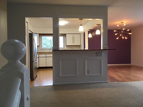 Up half flight of stairs to LR/DR/Kitchen area