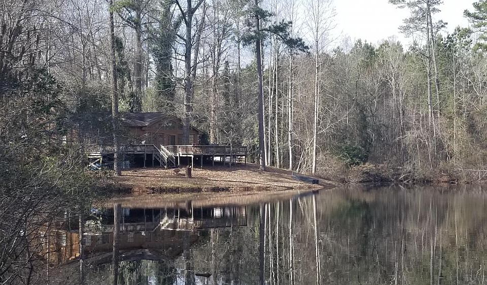 Back porch overlooking 1.5-acre pond