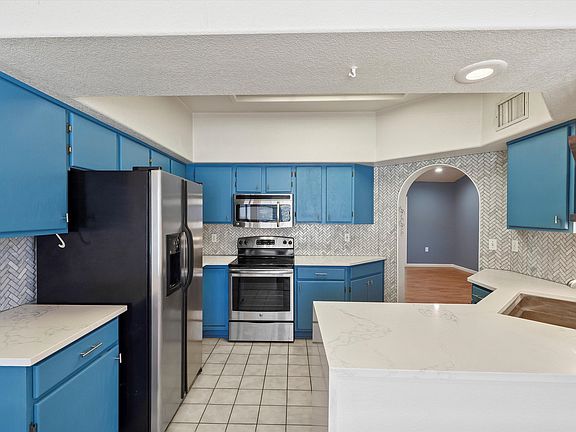 Quartz countertops with waterfall feature!