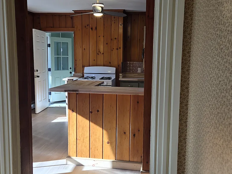 Kitchen looking toward rear entrance