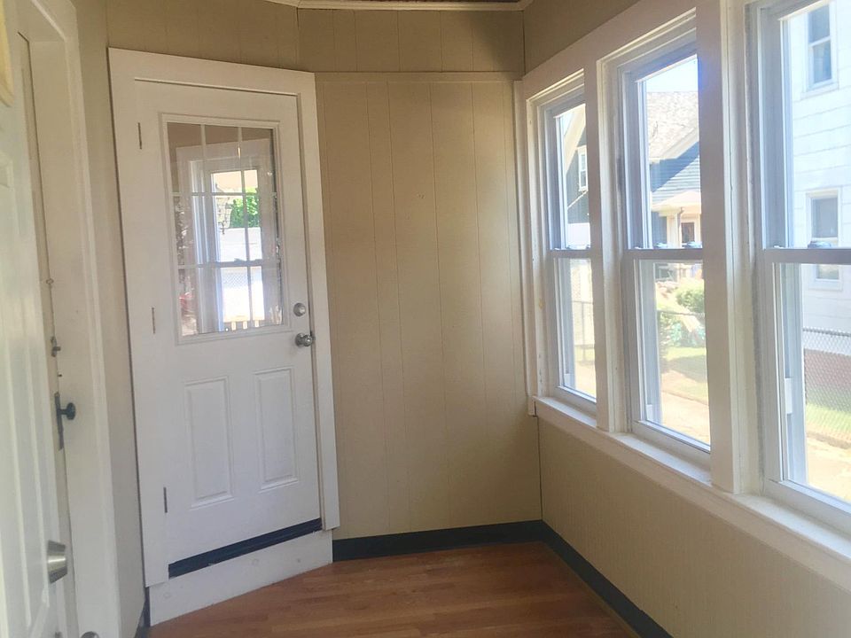 Private entry features 2 locking doors and finished 3 season room