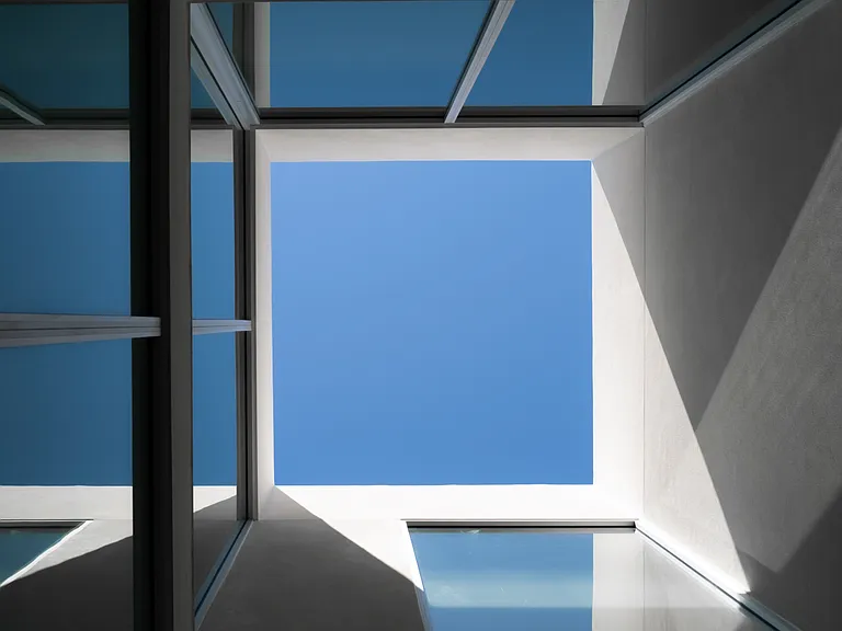 Architectural Atrium_ This signature Asteras Kings design maximizes natural light allowing an ever-changing dance of light to animate the space.