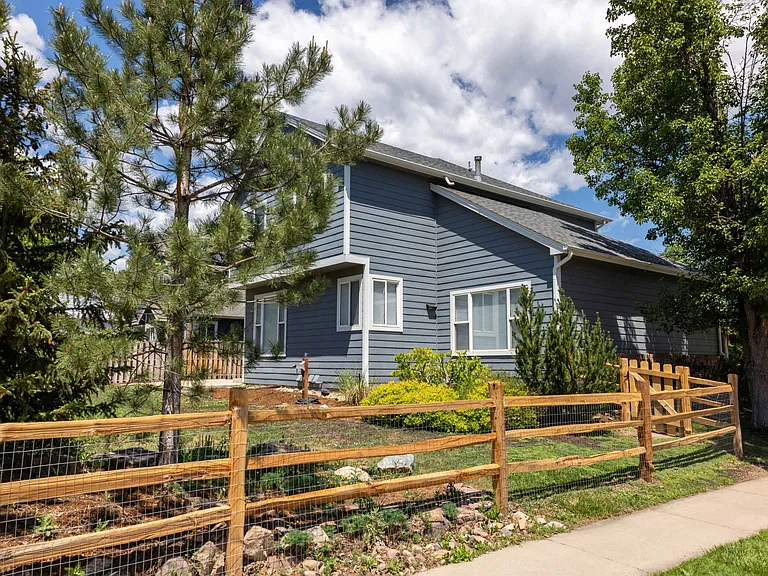 Situated on a spacious corner lot within a quiet cul-de-sac, the property features newly installed fencing, mature landscaping, and exceptional curb appeal.