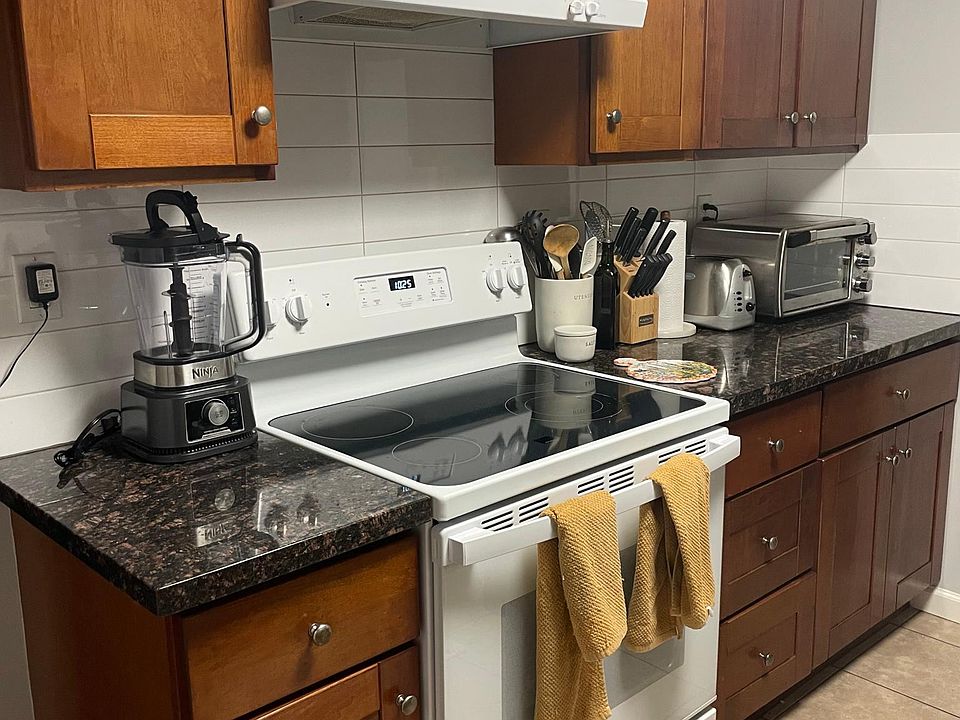 Updated kitchen. Glass top electric stove