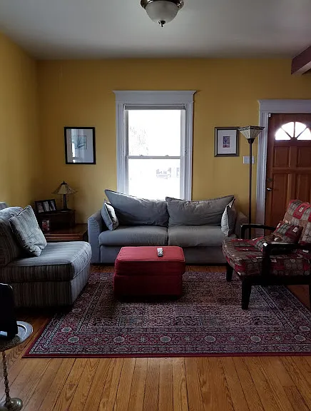 Diningroom look into livingroom and front of house