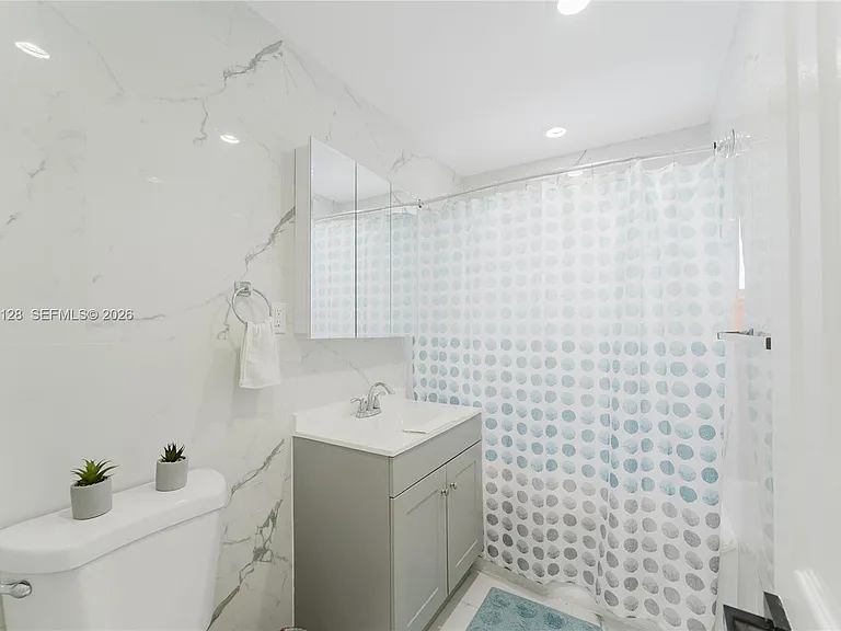 481 NE 51st St — Photo 23