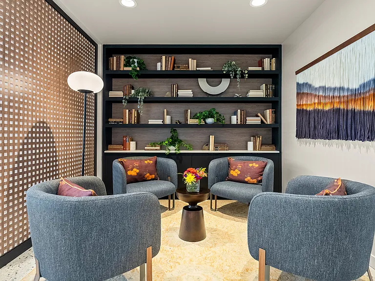 "Escape into a world of words: Our sky lounge library offers a serene retreat above the city, perfect for diving into your next literary adventure. ____