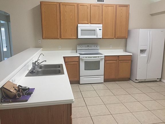 Large kitchen with room for table and chairs.