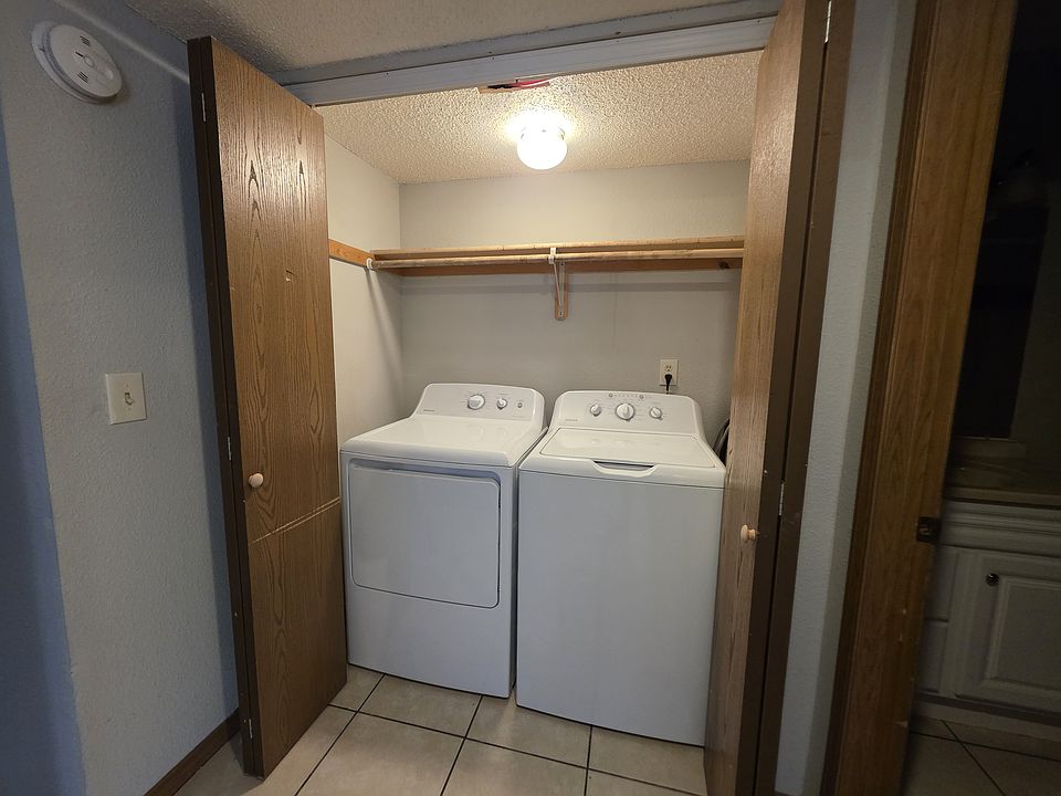Washer and dryer with storage space