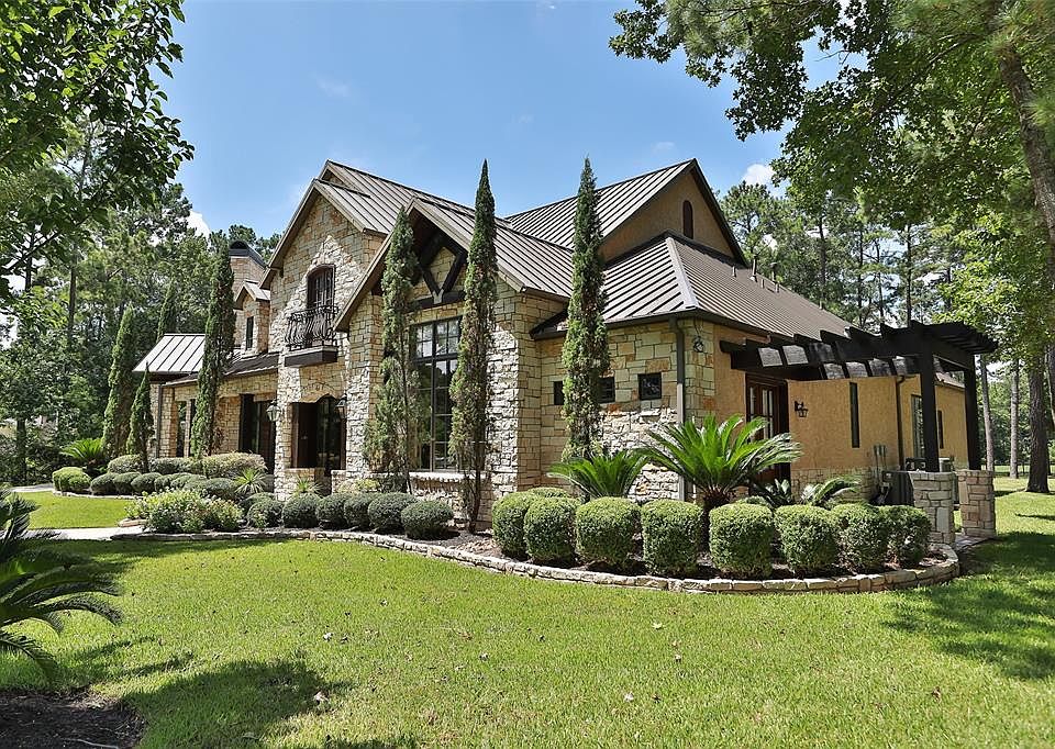 Another angle of this magnificent home! Pergola on right is off exercise room