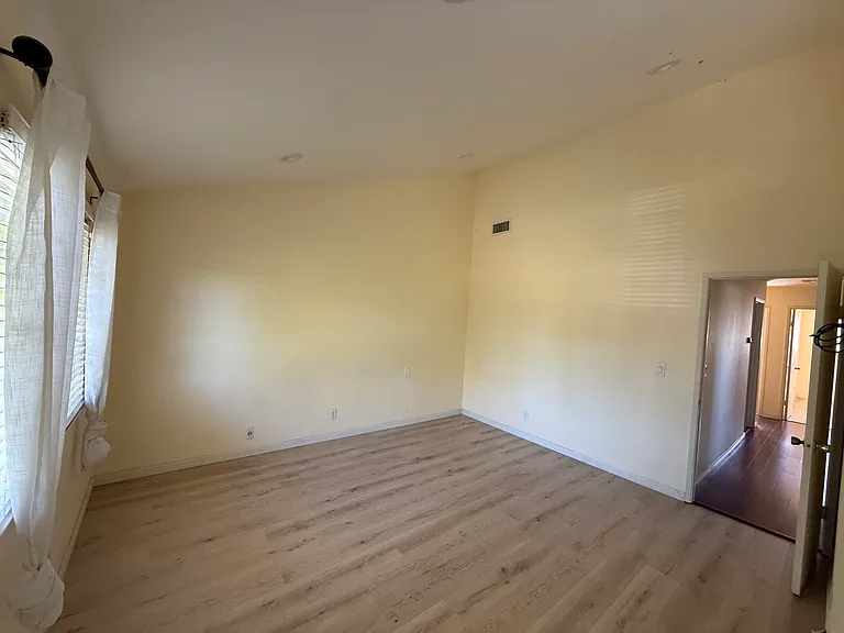 Master bedroom with new wooden flooring