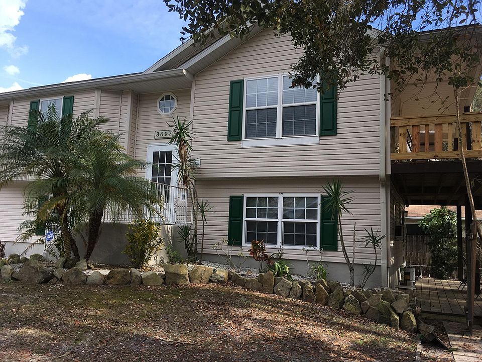 Fully furnished first floor apartment with two private entrances: enter from garage or back door to huge deck.