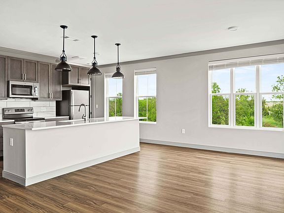 Open floor plan with large kitchen island
