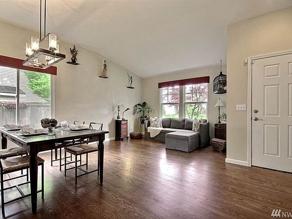 Vaulted ceilings greet you at entry! 