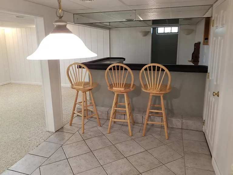 Downstairs view of Bar area and Family Room Area