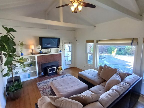 Living room soon to have new white Hunter Douglas shutters!