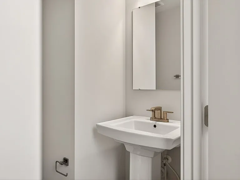 2nd floor powder room with pedestal sink