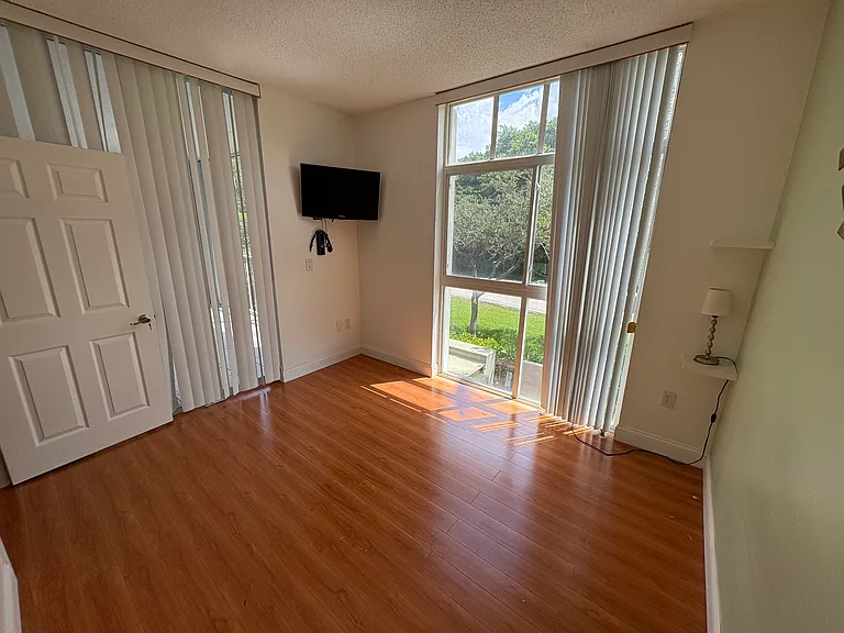9725 NW 52nd St #211 — Photo 11