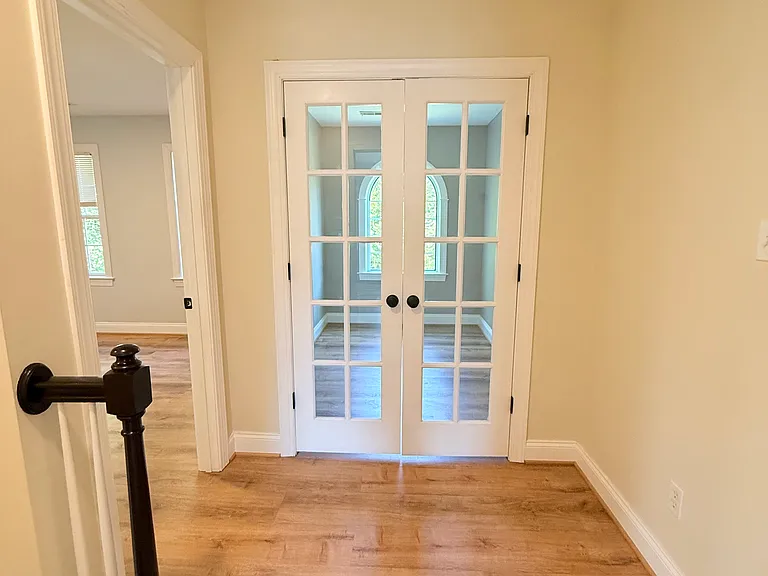 Adorable office/nursery directly to the left of staircase landing. (Comes with curtains)