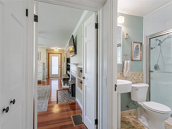 Master bathroom and living room