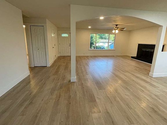 View of living room from rear sliding door.