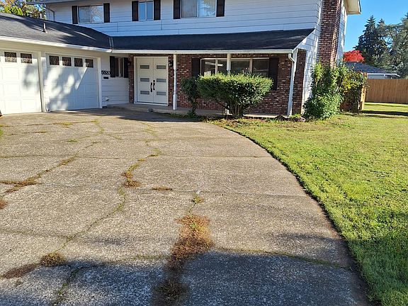 New front door and part of front yard.
