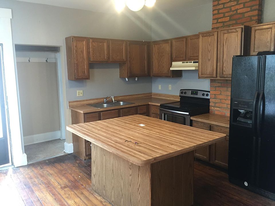 Kitchen with island, new stove and dishwasher