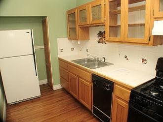 Kitchen with all appliances, ceramic counter top, glass fron