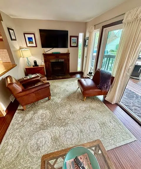 Living room with gas fireplace.