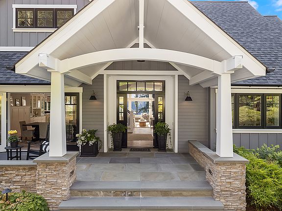 Beautiful covered porch welcomes you in!