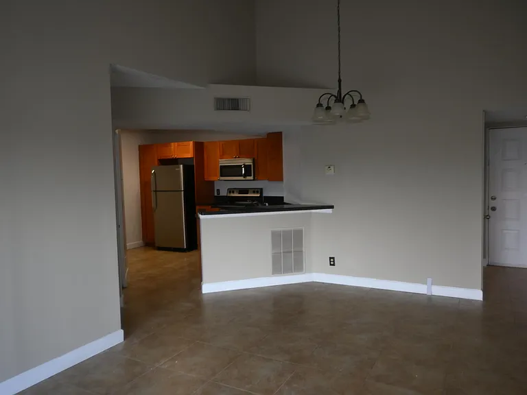 8721 Wiles Rd #305 — Photo 43