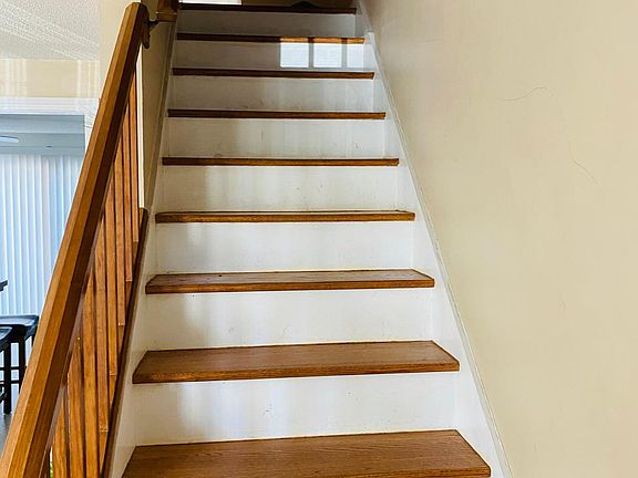 stairs to bedroom and 2nd bathroom
