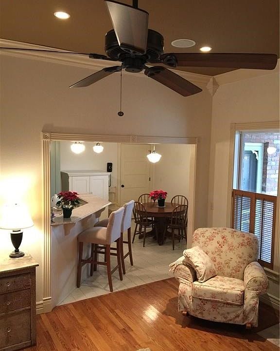 From the living room into the eat-in-kitchen and kitchen area.