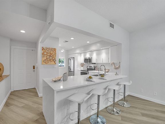 2nd image of 4130 W Palm Aire Drive #302D