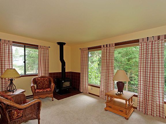 Open living room with cozy wood stove