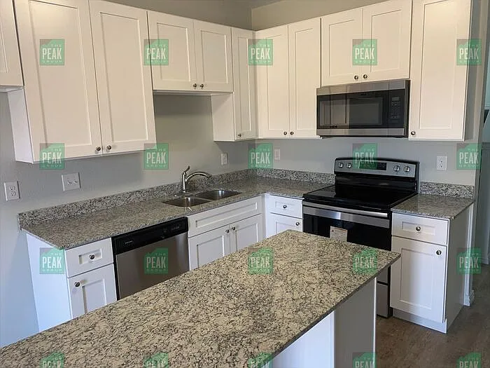 4614 Alamosa St — Photo 3