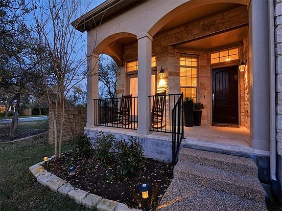 The open front porch welcomes you to the home.