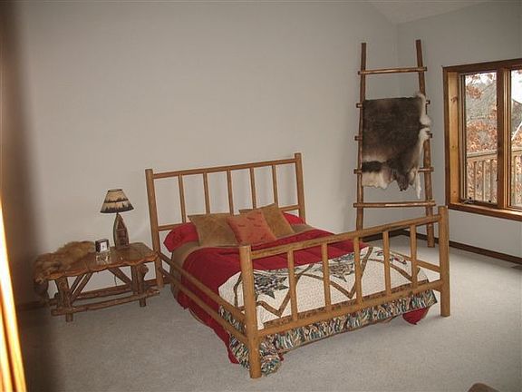 Master bedroom with view of Beaver Lake