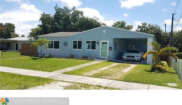 Home For Sale In MELALEUCA GARDENS RE