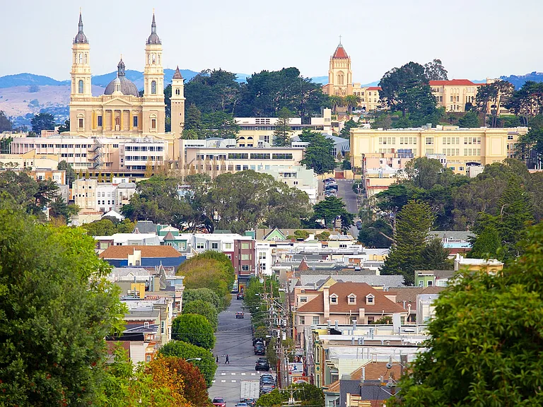 Nearby scenery including St Ignatius Cathedral and GG Bridge top
