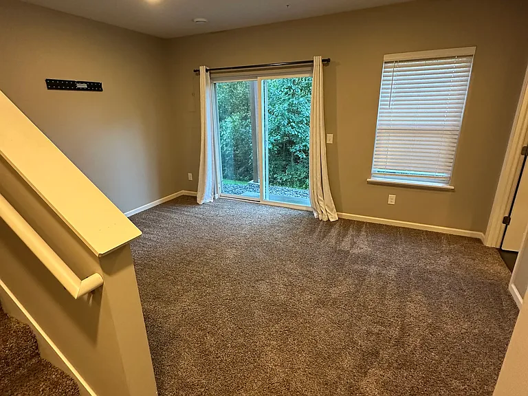 Lower level family room upon entry from garage.