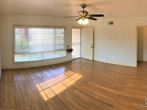 Giant living room with huge windows and sunlight all day