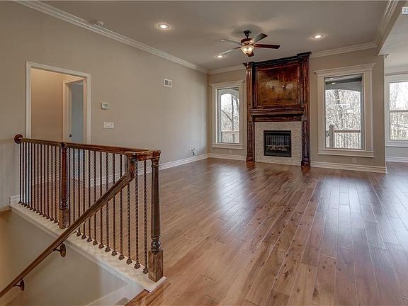 Direct-vent gas fireplace with auto start wall switch, hole home humidifier and pre-wired for security system, 5-speaker surroun