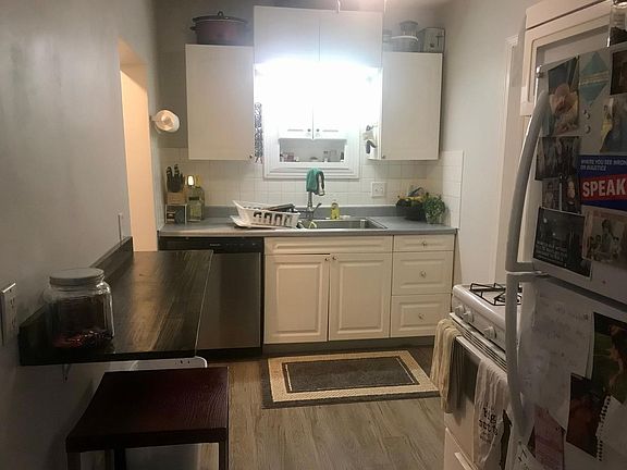 New dishwasher and refrigerator with added eat ledge